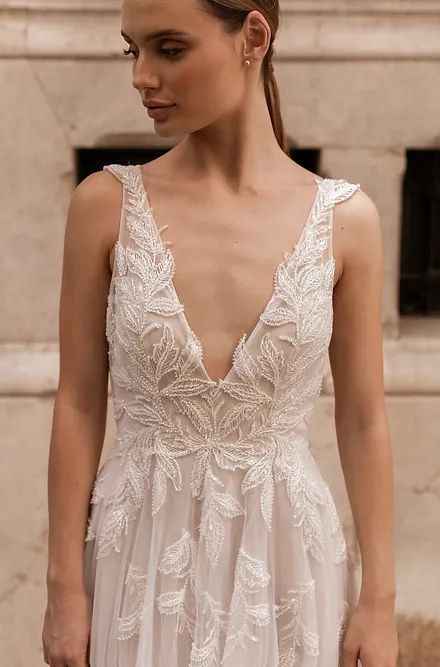 Brautkleid mit Federn